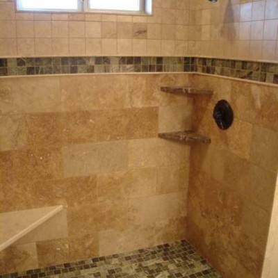 Travertine with mosaic shower