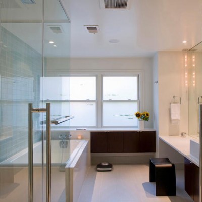 White ceaserstone counters glass subway shower