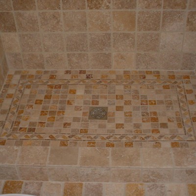 Yellow travertine mosaic shower floor